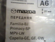 :       Mazda Familia       Mazda Familia.